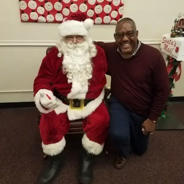 Steve Washington with Santa Claus